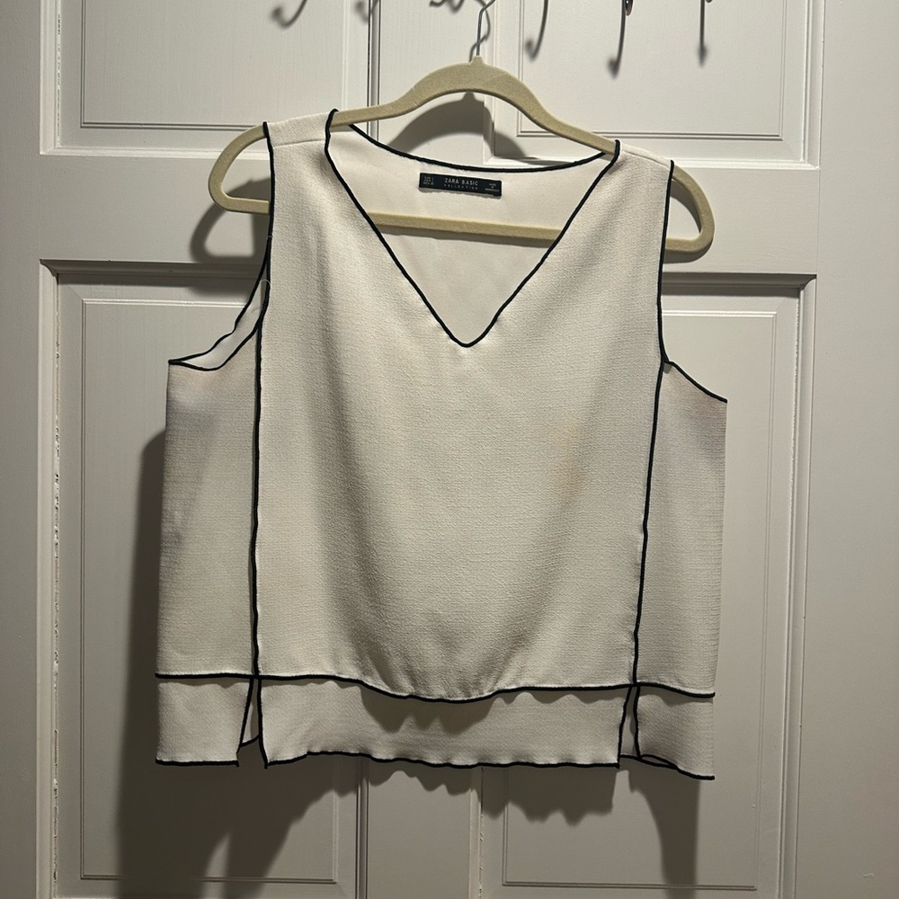 White tank with black trim